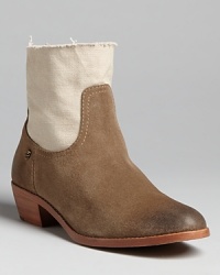 Lighten up your booties wardrobe with this seasonless Zadig & Voltaire design, with vintage appeal in broken-in canvas and suede. Lighten up your booties wardrobe with this seasonless Zadig & Voltaire design, with vintage appeal in broken-in canvas and suede.