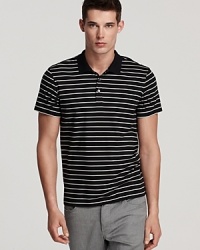 This versatile, plush cotton polo features an allover stripe pattern for an extra dimension to your casual cool wardrobe. This versatile, plush cotton polo features an allover stripe pattern for an extra dimension to your casual cool wardrobe.
