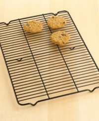 Fresh-out-of-the-oven treats are hard to resist; cool them more quickly with this hassle-free rack. Constructed of aluminized steel to resist rusting, its nonstick surface ensures easy cleaning and food release. Lifetime warranty. Fresh-out-of-the-oven treats are hard to resist; cool them more quickly with this hassle-free rack. Constructed of aluminized steel to resist rusting, its nonstick surface ensures easy cleaning and food release. Lifetime warranty.