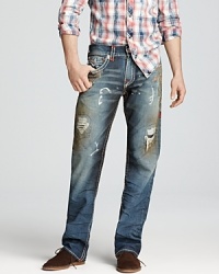 Heavily distressed with tears, paint splatters, smudges and patches, these expressive jeans give you that authentic and extreme look right from day one. Heavily distressed with tears, paint splatters, smudges and patches, these expressive jeans give you that authentic and extreme look right from day one.