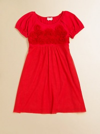 Dainty rosettes adorn the bodice of a stunning frock with full skirt and puff sleeves.ScoopneckPuff sleevesPullover styleGathered waist95% viscose/5% spandexHand washImported Dainty rosettes adorn the bodice of a stunning frock with full skirt and puff sleeves.ScoopneckPuff sleevesPullover styleGathered waist95% viscose/5% spandexHand washImported