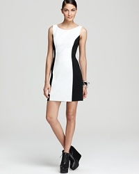 This body-con Aqua dress flaunts sleek leather at the front and cool color-blocking for statement style that meets the season with chic. This body-con Aqua dress flaunts sleek leather at the front and cool color-blocking for statement style that meets the season with chic.