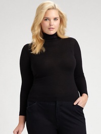 Fine-gauge Merino wool in a classic silhouette.Ribbed collarLong sleevesPullover styleAbout 25½ from shoulder to hemMerino woolDry cleanImported Fine-gauge Merino wool in a classic silhouette.Ribbed collarLong sleevesPullover styleAbout 25½ from shoulder to hemMerino woolDry cleanImported