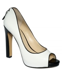 You'll be the one breaking hearts in this seductive shoe. Nine West's Heartache platform pumps feature sexy stitched lacing on the upper back heel. You'll be the one breaking hearts in this seductive shoe. Nine West's Heartache platform pumps feature sexy stitched lacing on the upper back heel.