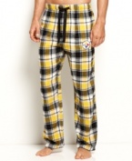 Cheer for your favorite team even while you're sleeping in these cozy plaid NFL pajama pants by College Concepts.