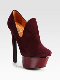 A head-turning silhouette of ultra-soft suede with a commanding patent leather island platform. Self-covered heel, 5¾ (145mm)Patent leather island platform, 1¾ (45mm)Compares to a 4 heel (100mm)Suede upperLeather lining and solePadded insoleMade in Italy A head-turning silhouette of ultra-soft suede with a commanding patent leather island platform. Self-covered heel, 5¾ (145mm)Patent leather island platform, 1¾ (45mm)Compares to a 4 heel (100mm)Suede upperLeather lining and solePadded insoleMade in Italy