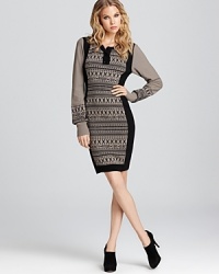 Fair Isle gets a fashion-forward update on this cozy Sonia Rykiel sweater dress. Fair Isle gets a fashion-forward update on this cozy Sonia Rykiel sweater dress.