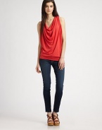 Super-soft cowlneck tank with a banded hem can be perfectly paired with skinny jeans or a fitted skirt. CowlneckSleevelessBanded hem95% rayon/5% spandexDry cleanMade in USAModel shown is 5'10 (177cm) wearing US size Small.