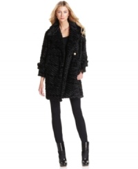 Vince Camuto's textured faux fur coat adds effortless chic to anything you wear with it. Vince Camuto's textured faux fur coat adds effortless chic to anything you wear with it.