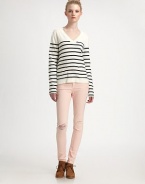 The classic V-neck pullover in a soft cotton/cashmere knit, striped and styled with a slightly flared hem.V necklineLong sleevesPatch pocketsContour hem longer in backAbout 24 from shoulder to hem95% cotton/5% cashmereDry cleanImportedModel shown is 5'10 (177cm) wearing US size Small.