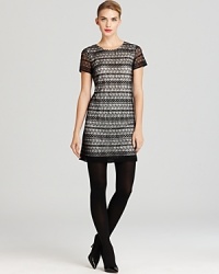 This wispy lace Tegan dress lends colorful flair and elegance to your fall wardrobe in a classic shift silhouette. This wispy lace Tegan dress lends colorful flair and elegance to your fall wardrobe in a classic shift silhouette.