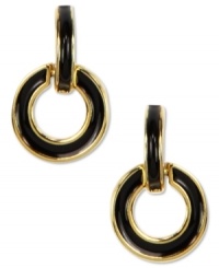 Let haute style in! These doorknocker earrings from Anne Klein flaunt the complementary pairing of jet black enamel and golden shine. Crafted in gold tone mixed metal. Approximate drop: 1-1/2 inches. Let haute style in! These doorknocker earrings from Anne Klein flaunt the complementary pairing of jet black enamel and golden shine. Crafted in gold tone mixed metal. Approximate drop: 1-1/2 inches.