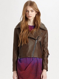 Plush shearling collar and asymmetrical zippers enhance this buttery leather topper. Notched shearling collarLong sleeves with zippered cuffsFront snap closuresButton frontAsymmetrical zipperZippered slash pocketsAbout 19 from shoulder to hemLeatherDry cleanImportedFur origin: SpainModel shown is 5'10 (177cm) wearing US size 4. Plush shearling collar and asymmetrical zippers enhance this buttery leather topper. Notched shearling collarLong sleeves with zippered cuffsFront snap closuresButton frontAsymmetrical zipperZippered slash pocketsAbout 19 from shoulder to hemLeatherDry cleanImportedFur origin: SpainModel shown is 5'10 (177cm) wearing US size 4.