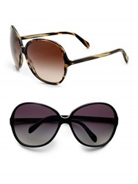 Oversized round frames handcrafted in thin plastic for a lightweight feel and glamorous look. Available in tortoise with brown gradient lens or black with grey gradient lens. 100% UV protection Imported Oversized round frames handcrafted in thin plastic for a lightweight feel and glamorous look. Available in tortoise with brown gradient lens or black with grey gradient lens. 100% UV protection Imported