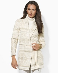 Subtly festive for the season, a soft knit cardigan is crafted with a handsome shawl collar and subtle snowflake pattern. Subtly festive for the season, a soft knit cardigan is crafted with a handsome shawl collar and subtle snowflake pattern.