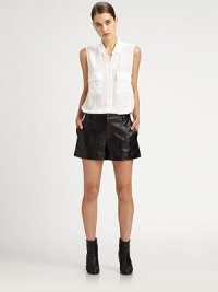 The shining star of the sartorial moment is leather shorts. This butter-soft design features denim-inspired details.Belt loopsHook-and-eye closureZip flySlash pocketsBack waist dartsBack welt pocketsInseam, about 4Rise, about 9Lambskin leatherDry clean by leather specialistImportedSIZE & FIT Model shown is 5'10 (177cm) wearing a US size 4. The shining star of the sartorial moment is leather shorts. This butter-soft design features denim-inspired details.Belt loopsHook-and-eye closureZip flySlash pocketsBack waist dartsBack welt pocketsInseam, about 4Rise, about 9Lambskin leatherDry clean by leather specialistImportedSIZE & FIT Model shown is 5'10 (177cm) wearing a US size 4.