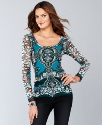 Make their heads turn with a fitted scoopneck top from INC. Shimmering sequins add sparkle to an appealing exotic print. Make their heads turn with a fitted scoopneck top from INC. Shimmering sequins add sparkle to an appealing exotic print.