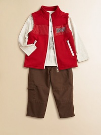 Big graphic letters on a splotchy background announce DKNY, with a cozy, fleece vest and twill cargo pants to complete this cool look.Zip-front fleece vest with stand collar, nylon chest insert with logo and vertical zip pocketsLong-sleeve tee with ribbed crewneck and signature front printTwill pants with snap close, back elastic waist, belt loops, cargo pocket and back patch pocketsVest and tee: 60% cotton/40% polyesterPants: cottonMachine washImported Big graphic letters on a splotchy background announce DKNY, with a cozy, fleece vest and twill cargo pants to complete this cool look.Zip-front fleece vest with stand collar, nylon chest insert with logo and vertical zip pocketsLong-sleeve tee with ribbed crewneck and signature front printTwill pants with snap close, back elastic waist, belt loops, cargo pocket and back patch pocketsVest and tee: 60% cotton/40% polyesterPants: cottonMachine washImported