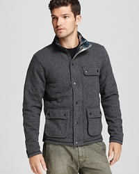 Designed for outdoor adventure from the trail to the streets, this jacket sports a heathered finish, a stand collar collar with a plaid interior and three snap pockets for your small gear. Designed for outdoor adventure from the trail to the streets, this jacket sports a heathered finish, a stand collar collar with a plaid interior and three snap pockets for your small gear.