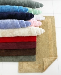 Pick a color, any color! This gorgeous rug will coordinate beautifully with any bathroom. In a heavy weight pile for superb absorbency and a plush feel. Finished with a tonal textured border. (Clearance) Pick a color, any color! This gorgeous rug will coordinate beautifully with any bathroom. In a heavy weight pile for superb absorbency and a plush feel. Finished with a tonal textured border. (Clearance)