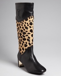 Isaac Mizrahi New York lends exotic appeal to these low heeled, kittenish boots with leopard-print, calf hair shafts. Add a wild touch to your work wardrobe. Isaac Mizrahi New York lends exotic appeal to these low heeled, kittenish boots with leopard-print, calf hair shafts. Add a wild touch to your work wardrobe.