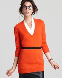 As easy as a sweatshirt, but infinitely more chic, this cashmere Magaschoni tunic ups the sophistication factor of every piece in your closet. As easy as a sweatshirt, but infinitely more chic, this cashmere Magaschoni tunic ups the sophistication factor of every piece in your closet.