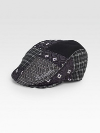 A signature array of distinctive prints and patterns adorns this traditional driver cap style, rendered in an exquisite blend of Italian wool and silk.50% silk/25% polyester/25% woolDry cleanImported of Italian fabric A signature array of distinctive prints and patterns adorns this traditional driver cap style, rendered in an exquisite blend of Italian wool and silk.50% silk/25% polyester/25% woolDry cleanImported of Italian fabric