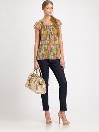 Printed cotton/silk voile gathers softly at the bodice of this airy cap-sleeve blouse.Ruffled collarDrawstring necklineCap sleevesStraight hemAbout 28 from shoulder to hem74% cotton/26% silkDry cleanMade in USA of Italian fabricModel shown is 5'11 (180cm) wearing US size 4. Printed cotton/silk voile gathers softly at the bodice of this airy cap-sleeve blouse.Ruffled collarDrawstring necklineCap sleevesStraight hemAbout 28 from shoulder to hem74% cotton/26% silkDry cleanMade in USA of Italian fabricModel shown is 5'11 (180cm) wearing US size 4.