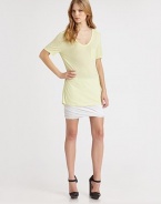 Dropped shoulders and a patch pocket enhance this lengthy, lightweight v-neck. Rounded v-neckDropped shouldersShort sleevesFront patch pocketLonger length hits below the hipsRayonHand washImportedModel shown is 5'9½ (176cm) wearing US size Small.