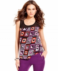 A deco-inspired geometric print defines this flowing blouse from DKNYC as a must-have statement piece for the season. Pairing it with colored denim gives the look an extra pop. A deco-inspired geometric print defines this flowing blouse from DKNYC as a must-have statement piece for the season. Pairing it with colored denim gives the look an extra pop.