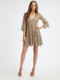 A vision of romance in gorgeous lace, styled in a flowy V-neck shift.V necklineThree-quarter bell sleevesInverted panels add flare to skirtAbout 19 from natural waist55% cotton/28% rayon/17% nylonDry cleanImported A vision of romance in gorgeous lace, styled in a flowy V-neck shift.V necklineThree-quarter bell sleevesInverted panels add flare to skirtAbout 19 from natural waist55% cotton/28% rayon/17% nylonDry cleanImported