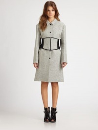 Lightweight, wool-rich coat shaped with a modified Peter Pan collar and partially exposed corset. Modified Peter Pan collarLong sleevesButton frontPartially exposed zippered corsetFully linedLonger length hits just above the knee65% virgin wool/25% nylon/10% alpacaDry cleanImportedModel shown is 5'8 (175cm) wearing US size 4. Lightweight, wool-rich coat shaped with a modified Peter Pan collar and partially exposed corset. Modified Peter Pan collarLong sleevesButton frontPartially exposed zippered corsetFully linedLonger length hits just above the knee65% virgin wool/25% nylon/10% alpacaDry cleanImportedModel shown is 5'8 (175cm) wearing US size 4.
