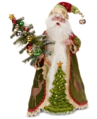 Holly jolly Santa Claus in traditional red, green and gold colors holds a festive Christmas tree in this figurine from Mark Roberts. Holly jolly Santa Claus in traditional red, green and gold colors holds a festive Christmas tree in this figurine from Mark Roberts.