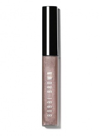 A pick-me-up for lips with non-sticky shine, Brightening Lip Gloss is a magic trick Bobbi always has in her bag. Part of the Caviar & Oyster Collection, it works on all skin tones and instantly makes lips look fuller, brighter and fresher. Wear these sheer, highly reflective glosses on bare lips or layered over lipstick for a lush finish. Made in USA. A pick-me-up for lips with non-sticky shine, Brightening Lip Gloss is a magic trick Bobbi always has in her bag. Part of the Caviar & Oyster Collection, it works on all skin tones and instantly makes lips look fuller, brighter and fresher. Wear these sheer, highly reflective glosses on bare lips or layered over lipstick for a lush finish. Made in USA.