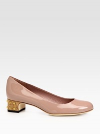 Patent leather silhouette on a low cork heel with metal studs. Studded cork heel, 1½ (40mm)Patent leather upperLeather lining and solePadded insoleMade in Italy Patent leather silhouette on a low cork heel with metal studs. Studded cork heel, 1½ (40mm)Patent leather upperLeather lining and solePadded insoleMade in Italy