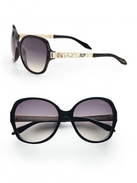Chic round style with python printed leather accented temples on a lightweight, plastic frame. Available in black/ivory python/rose gold with smoke gradient lens. Python printed leather and logo accented temples100% UV protectionMade in Italy 