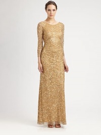 Shimmering allover sequins decorate this festive, floor-length silhouette.Jewel necklineSheer three-quarter sleevesLow backConcealed back zipFully linedAbout 44 from natural waistNylonSpot cleanImportedModel shown is 5'10½ (179cm) wearing US size 4. Shimmering allover sequins decorate this festive, floor-length silhouette.Jewel necklineSheer three-quarter sleevesLow backConcealed back zipFully linedAbout 44 from natural waistNylonSpot cleanImportedModel shown is 5'10½ (179cm) wearing US size 4.