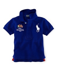 A preppy short-sleeved polo shirt in breathable cotton mesh is accented with country embroidery, celebrating Team USA's participation in the 2012 Olympics.