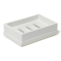 Sleek and sophisticated in cool white, these hand-lacquered bath accessories brighten any bathroom. Sleek and sophisticated in cool white, these hand-lacquered bath accessories brighten any bathroom.