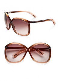 Modern oversized cat eye shaped frames with iconic Tom Ford floating lens and tubular acetate temple. Available in gradient brown/light orange with gradient brown/rose lens.Acetate 100% UV protection Made in Italy Modern oversized cat eye shaped frames with iconic Tom Ford floating lens and tubular acetate temple. Available in gradient brown/light orange with gradient brown/rose lens.Acetate 100% UV protection Made in Italy