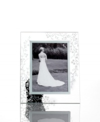 Keep memories fresh. Etched with cascading florals, the glass Trousseau picture frame from Martha Stewart Collection gives special moments a romantic sensibility. Keep memories fresh. Etched with cascading florals, the glass Trousseau picture frame from Martha Stewart Collection gives special moments a romantic sensibility.