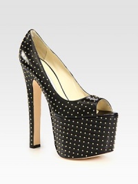 An entrance-making platform design of studded leather, with a timeless peep toe and ultra-high heel. Self-covered heel, 6½ (165mm)Covered platform, 2¾ (70mm)Compares to a 3¾ heel (95mm)Studded leather upperPeep toeLeather lining and solePadded insoleMade in ItalyOUR FIT MODEL RECOMMENDS ordering one half size up as this style runs small. An entrance-making platform design of studded leather, with a timeless peep toe and ultra-high heel. Self-covered heel, 6½ (165mm)Covered platform, 2¾ (70mm)Compares to a 3¾ heel (95mm)Studded leather upperPeep toeLeather lining and solePadded insoleMade in ItalyOUR FIT MODEL RECOMMENDS ordering one half size up as this style runs small.