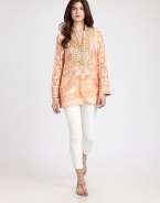 A glamorous take on the classic tunic, this silk design features metallic embellishments along its feminine neckline.Embellished necklineLong sleevesSide slitsAbout 29 from shoulder to hemSilkDry cleanImported Model shown is 5'10 (177cm) wearing US size 4. OUR FIT MODEL RECOMMENDS ordering true size. 