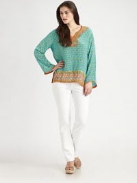 A vivid floral print breathes new life into a classic silhouette with a beloved fit.Ultra-feminine, embroidered necklineLong sleevesAllover printPull-on styleContrasting trimSide slitsAbout 29 from shoulder to hemSilkDry cleanImported A vivid floral print breathes new life into a classic silhouette with a beloved fit.Ultra-feminine, embroidered necklineLong sleevesAllover printPull-on styleContrasting trimSide slitsAbout 29 from shoulder to hemSilkDry cleanImported