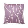 Delicate, soothing lines dance across this decorative pillow, adding a dose of stylish comfort to any room.
