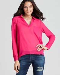 Standout in style with this brightly hued collared blouse from Olive and Oak. Team with distressed denim for off-duty chic. Standout in style with this brightly hued collared blouse from Olive and Oak. Team with distressed denim for off-duty chic.