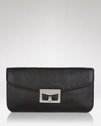 No girl's closet is complete without a black clutch, and this style from MARC BY MARC JACOBS is a step beyond basic. In embossed leather with silvery hardware, it's a timeless accessory. No girl's closet is complete without a black clutch, and this style from MARC BY MARC JACOBS is a step beyond basic. In embossed leather with silvery hardware, it's a timeless accessory.