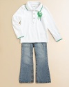 A light wash denim with decorative contrast stitching, fading on the thighs, distressed details and flare design. Belt loops Front zip with snap closure Scoop front pockets Coin flap pocket with snap Contrast horseshoe embroidery on back flap pockets Cotton Machine wash Imported of domestic fabric