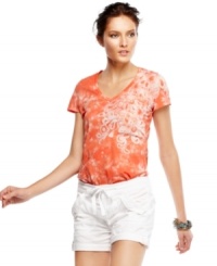 An allover tie-dye print with scrolling details at the shoulder lend a world-traveled look to this Calvin Klein Jeans top. An allover tie-dye print with scrolling details at the shoulder lend a world-traveled look to this Calvin Klein Jeans top.
