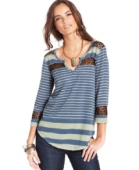 Sheer crochet insets show a hint of skin on this Free People striped top for a sexy spin on a casual basic! Sheer crochet insets show a hint of skin on this Free People striped top for a sexy spin on a casual basic!
